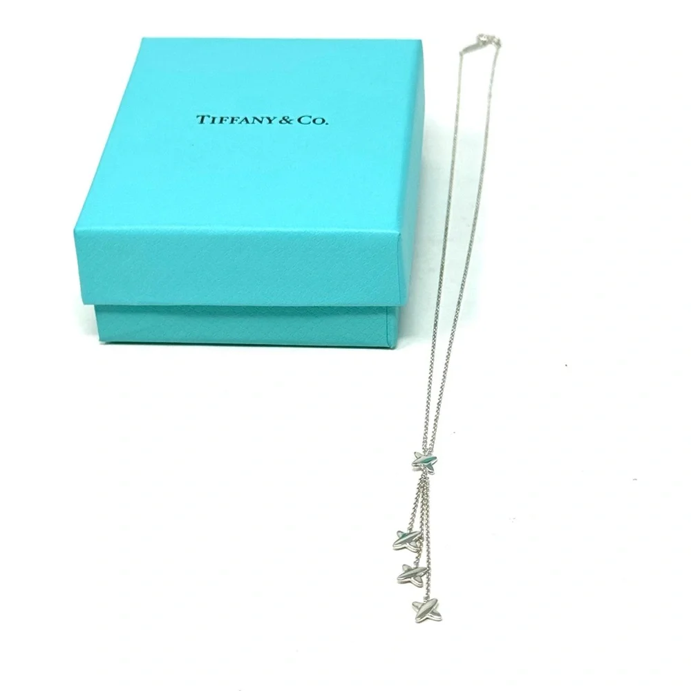 Authentic Tiffany & co. Triple X Kiss Cross Drope Necklace.